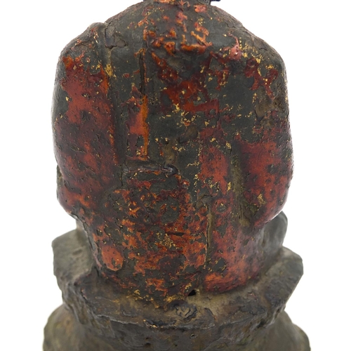 465 - Sino Tibetan bronze Buddha seated in the Lotus position, remnants of gilding and paint, 15cm high