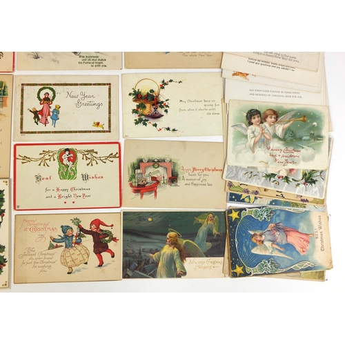 208 - Group of postcards including angel art greetings, Christmas and New Years greetings examples