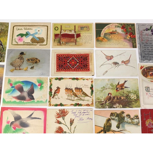 213 - Group of postcards including greetings, celluloid and bird examples