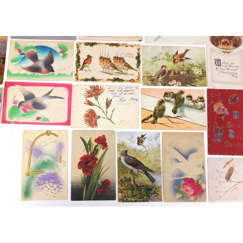 213 - Group of postcards including greetings, celluloid and bird examples