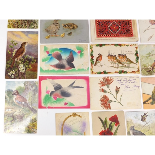 213 - Group of postcards including greetings, celluloid and bird examples