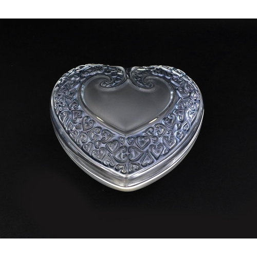 591 - Lalique clear and frosted glass heart shaped box and cover, the top decorated with scattered hearts,... 