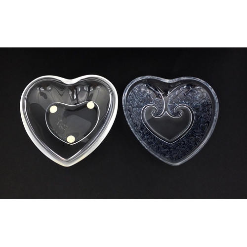 591 - Lalique clear and frosted glass heart shaped box and cover, the top decorated with scattered hearts,... 