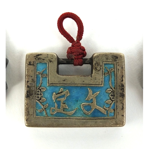 447 - Three Chinese silver coloured metal and enamelled locks, the largest 3.5cm high