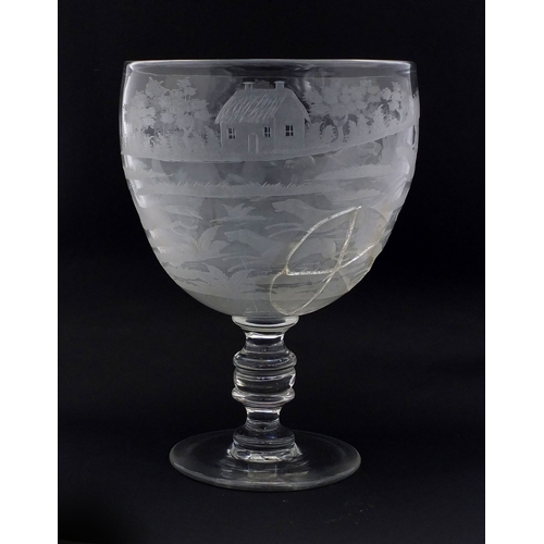 575 - Oversized 19th Century drinking goblet engraved with hunting scenes, 25cms high