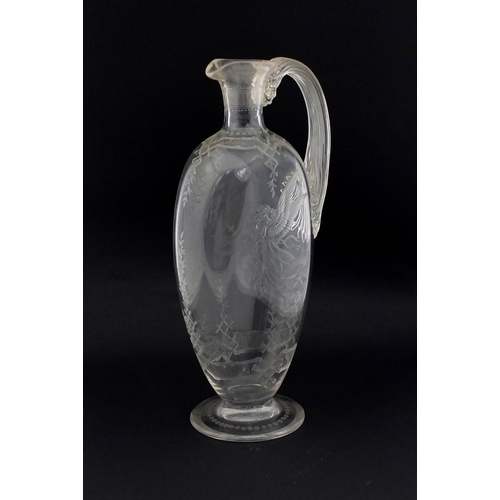 569 - 19th Century glass wine jug engraved with a guardian angel and child above a floral border, etched v... 