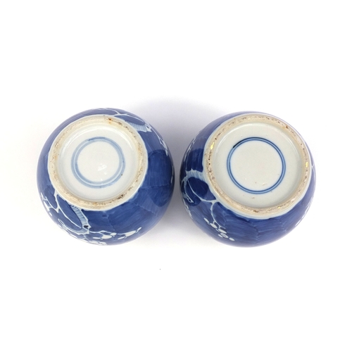 412 - Two Chinese blue and white porcelain ginger jars, both hand painted with Prunus flowers, blue ring m... 