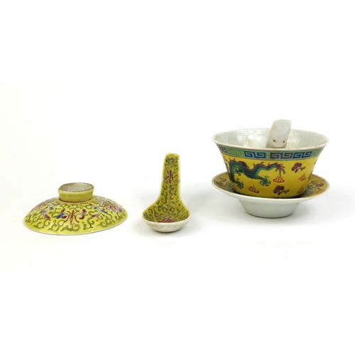 372 - Chinese porcelain soup bowl on stand with spoon, together with a spoon and cover, each hand painted ... 