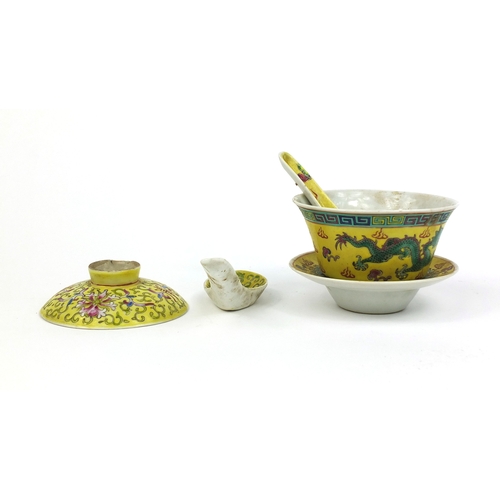 372 - Chinese porcelain soup bowl on stand with spoon, together with a spoon and cover, each hand painted ... 