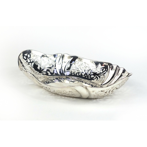 676 - Oval silver bread basket with pierced decoration, PJM Sheffield 1952, 30cm long, approximate weight ... 