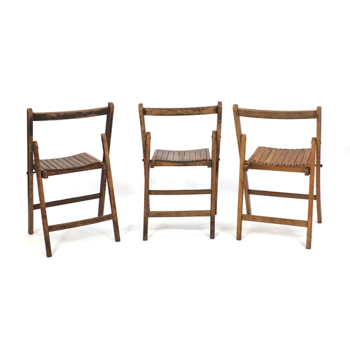 2056 - Group of three Military interest War Department/Air Ministry fold down chairs, each 83cm high