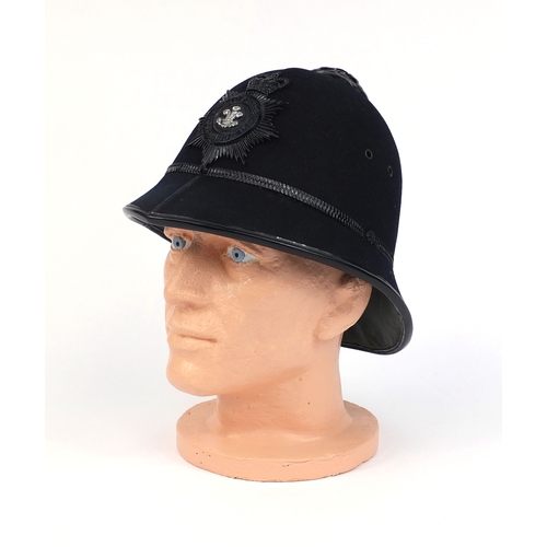 318 - Vintage Humberside police Rose top helmet with badge, 19cm high