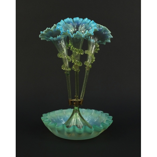 576 - Victorian pale blue frilled Vaseline glass three branch epergne, 38cm high