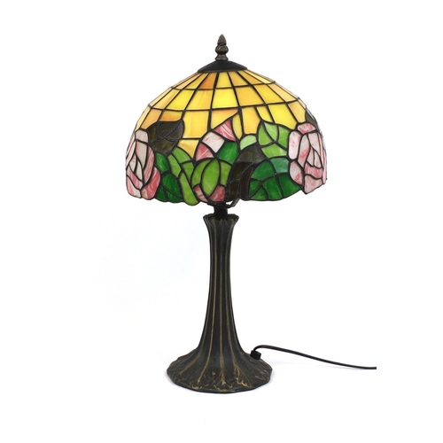 2214 - Tiffany design table lamp and leaded glass shade, decorated with flowers, 51cm high