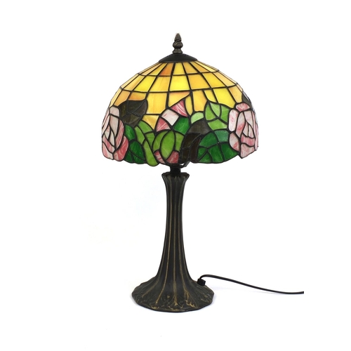 2214 - Tiffany design table lamp and leaded glass shade, decorated with flowers, 51cm high