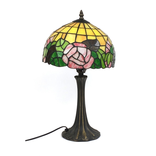 2214 - Tiffany design table lamp and leaded glass shade, decorated with flowers, 51cm high