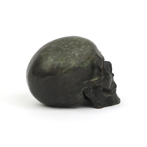 2131 - Bronze study of a skull, 10.5cm high