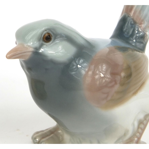 2083 - Wedgewood porcelain model of a hedgehog, together with a  Lladro bird, factory marks to the bases of... 