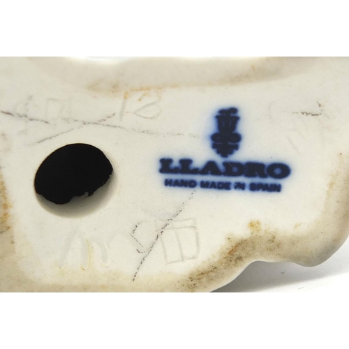 2083 - Wedgewood porcelain model of a hedgehog, together with a  Lladro bird, factory marks to the bases of... 