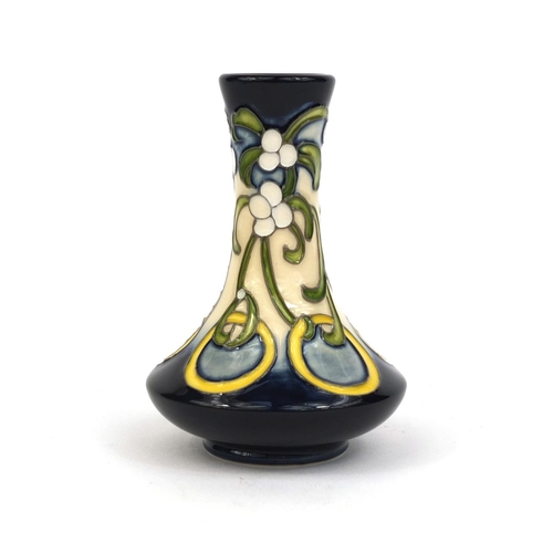 2170 - Moorcroft pottery vase hand painted and tube lined with stylised flowers, factory marks, initialled ... 