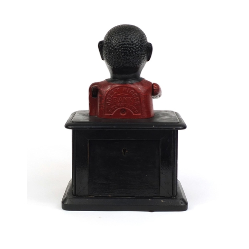 2142 - Vintage Jolly Negro bar top money box, 34cm high