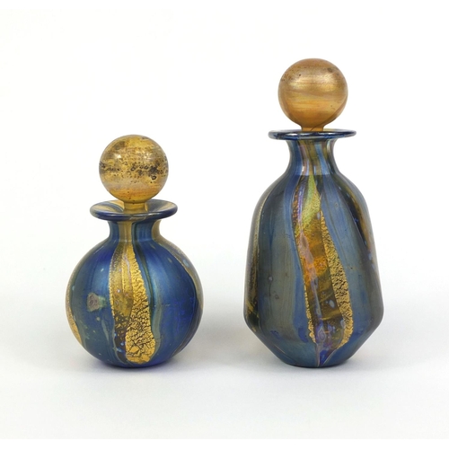 2103 - Two Isle of Wight iridescent glass scent bottles, each with paper label to the bases, the tallest 13... 