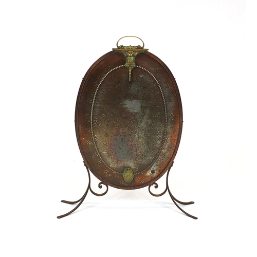 2059 - Copper and brass fire screen with brass handle and feet, 76cm high