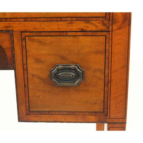 2002 - 19th Century inlaid satin wood ladies knee hole work table, fitted with three drawers raised on tape... 