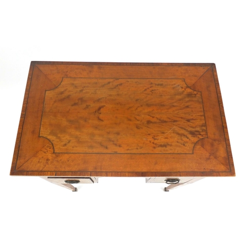 2002 - 19th Century inlaid satin wood ladies knee hole work table, fitted with three drawers raised on tape... 