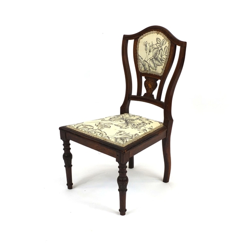 2027 - Victorian inlaid rosewood nursing chair with floral beige upholstered back and seat, 81cm high