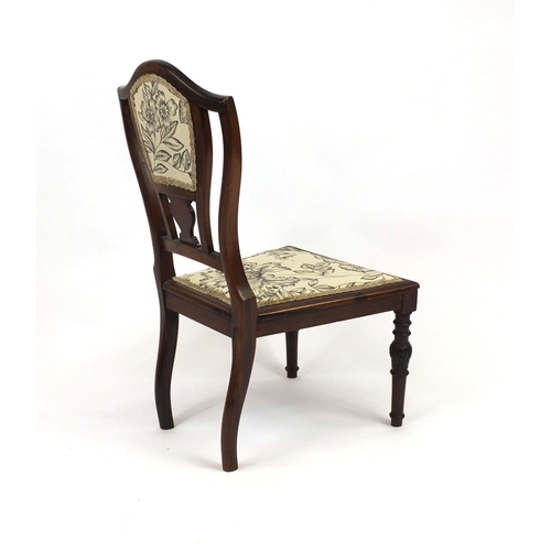 2027 - Victorian inlaid rosewood nursing chair with floral beige upholstered back and seat, 81cm high