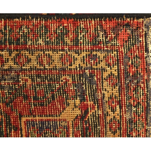 2016 - Rectangular Persian Meimeh carpet, having an all over stylised geometric design within geometric boa... 