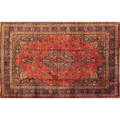 2028 - Rectangular Persian Meshed carpet, having an all over stylised floral design within foliate boarders... 