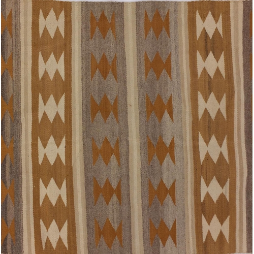 2042 - Rectangular Native American Navajo rug having an all over geometric design, 100cm x 74cm