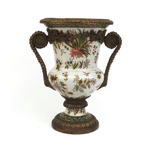 2127 - Twin handled urn shaped porcelain vase hand painted with flowers and foliage with stylised metal fit... 