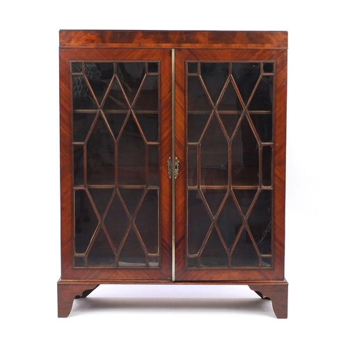 2015 - Victorian mahogany bookcase fitted with a pair of astragal glazed doors enclosing three adjustable s... 