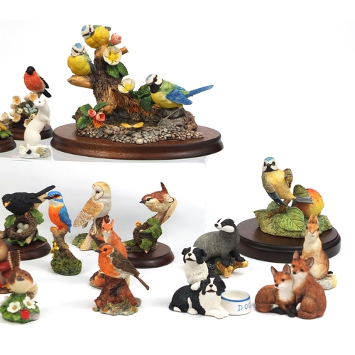 2185 - Large collection of mostly boarder fine arts animal models, some raised on plinth bases, the largest... 