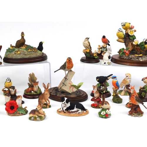 2185 - Large collection of mostly boarder fine arts animal models, some raised on plinth bases, the largest... 