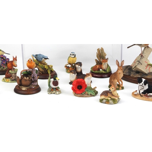 2185 - Large collection of mostly boarder fine arts animal models, some raised on plinth bases, the largest... 