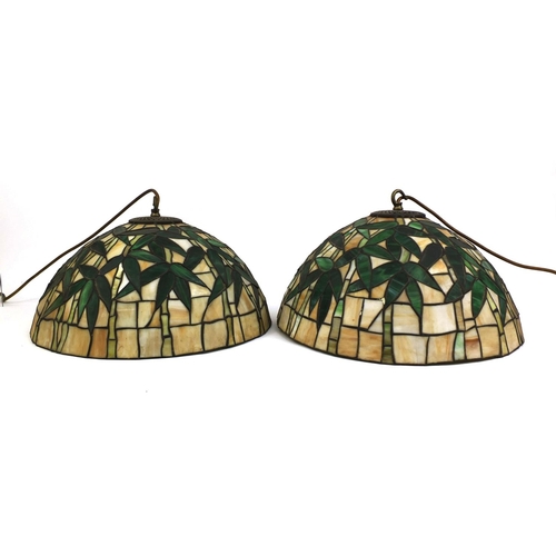 2160 - Pair of Tiffany & Co design leaded glass shades decorated with trees, each 40cm in diameter