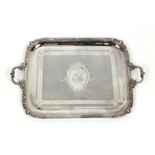 2203 - Good quality silver plated tray with leaf decoration and scrolling handles, 68cm wide x 44cm