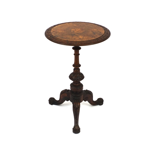 2035 - Circular walnut occasional  table, the top inlaid with a Roman figure on horseback on carved tripot ... 
