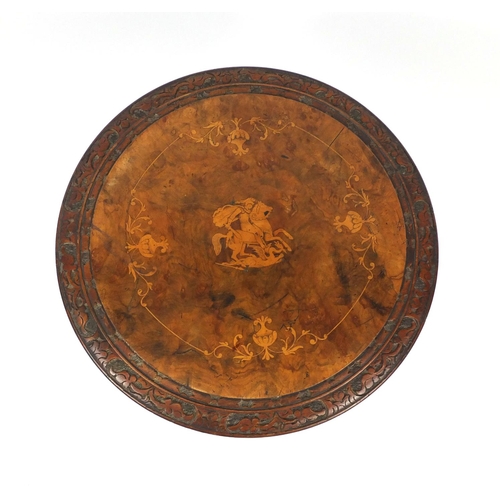 2035 - Circular walnut occasional  table, the top inlaid with a Roman figure on horseback on carved tripot ... 