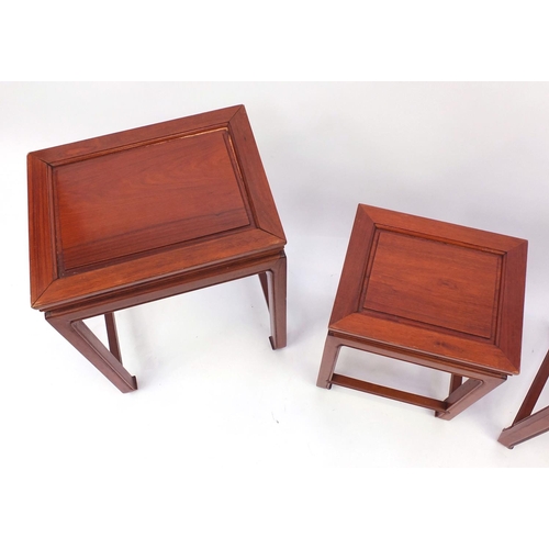 2044 - Nest of three Chinese and hardwood occasional tables, the largest 63cm high x 50cm wide x 38cm deep