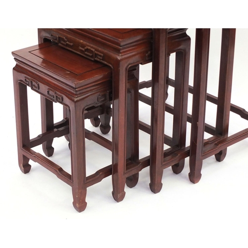 2033 - Quartetto nest of four Chinese hardwood tables, the largest 66cm high x 50cm wide x 35cm deep