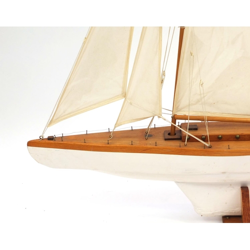 2153 - Wooden pond yacht with sails on stand, 125cm high