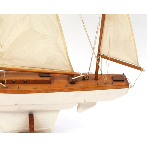 2153 - Wooden pond yacht with sails on stand, 125cm high