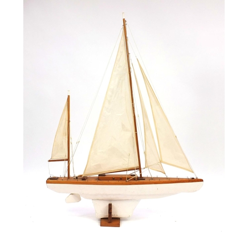 2153 - Wooden pond yacht with sails on stand, 125cm high