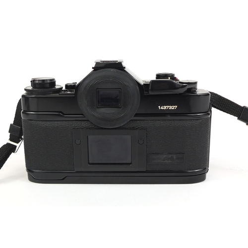 2209 - Canon A1 camera body together with three lenses comprising a HOYA HMC 58MM Skylight, a Tamron two x ... 