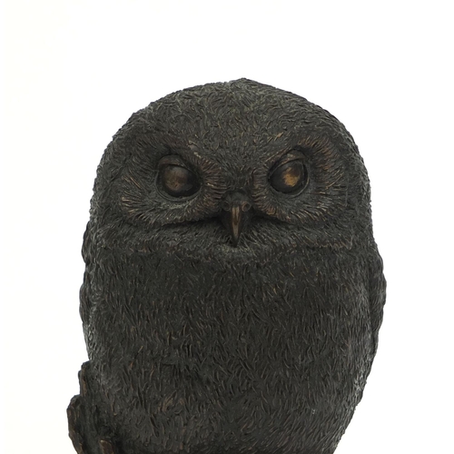 2240 - Bronze model of an owl perched on a tree trunk signed Dulk to the reverse, 21cm high